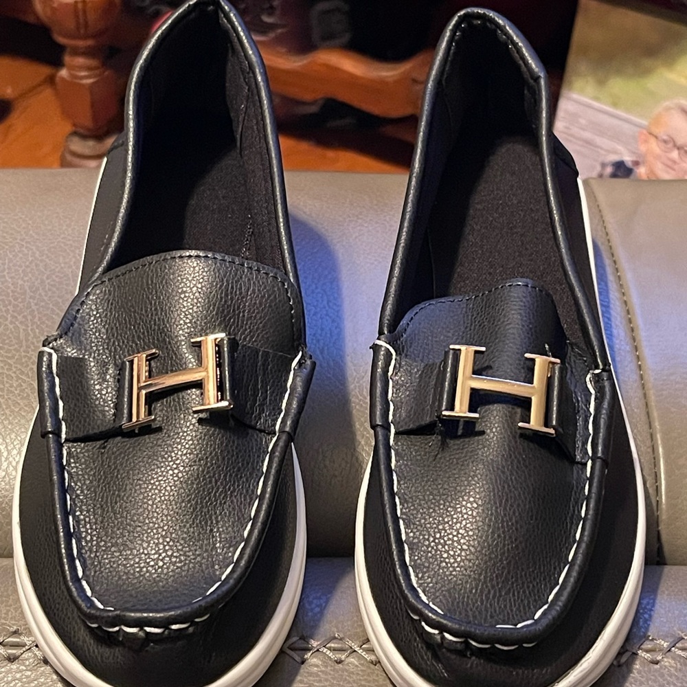 Black loafer type shoes. Never worn